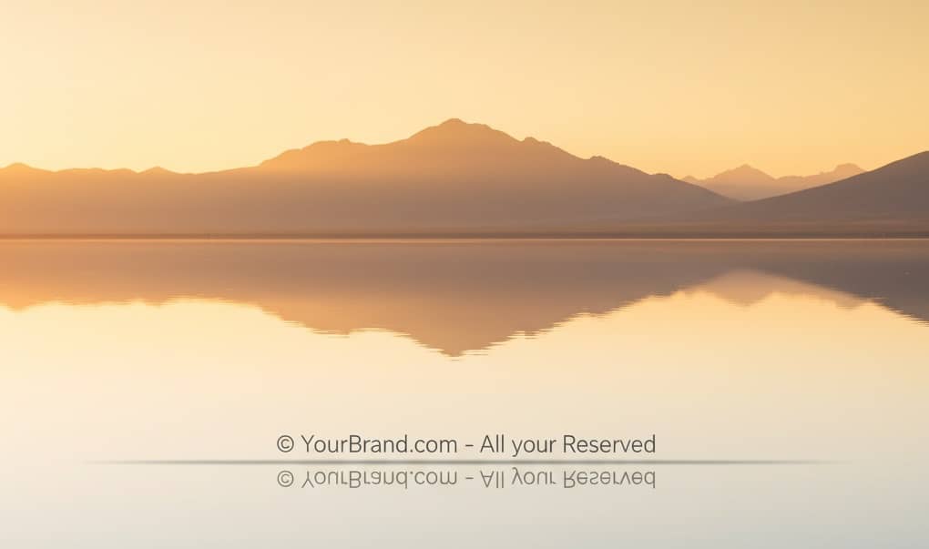 Watermark centered at bottom edge creating subtle waterline effect